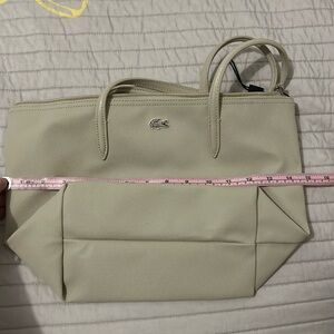 New w/o tag Lacoste cream bag